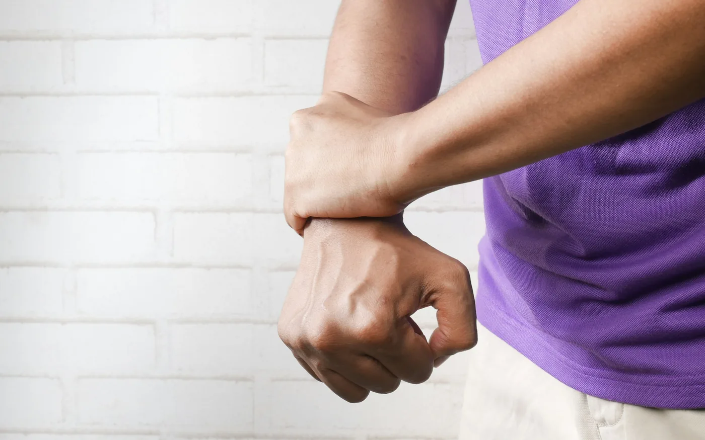 Tennis elbow pain sits on the outside of the elbow and worsens with gripping