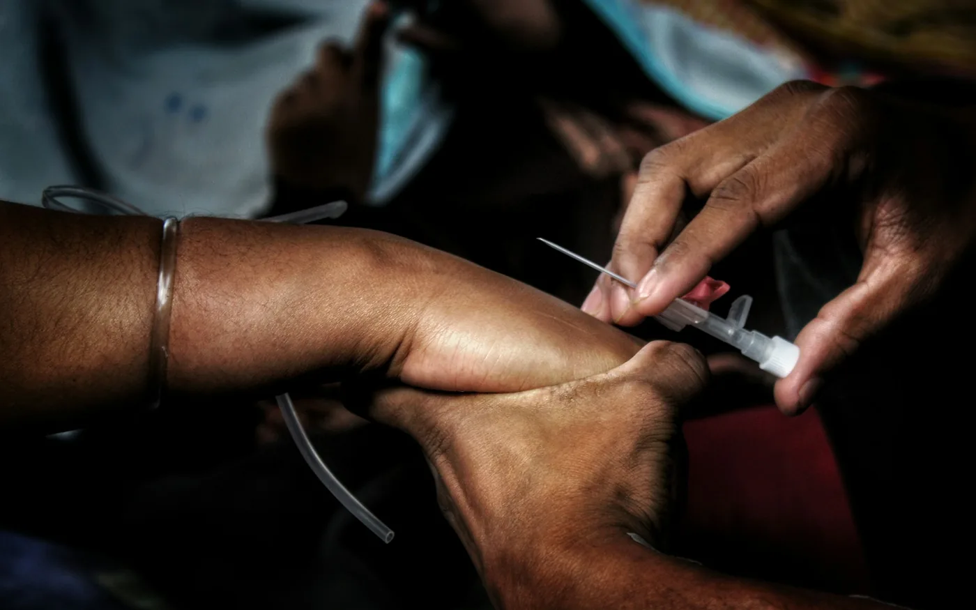 Treatment eases the symptom; progressive loading is what rebuilds the tendon