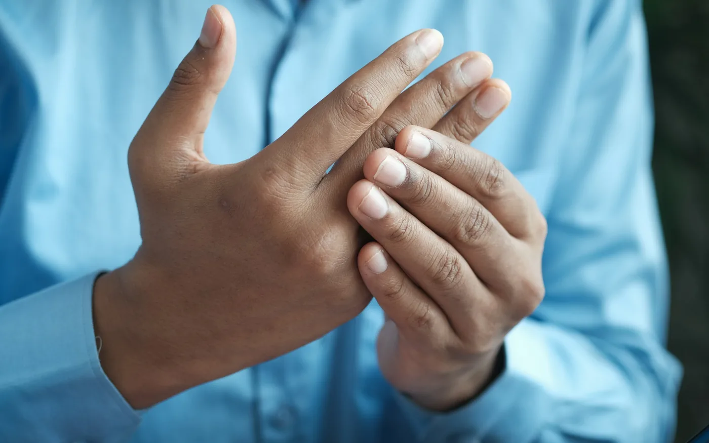 Needles placed at the wrist and forearm during treatment