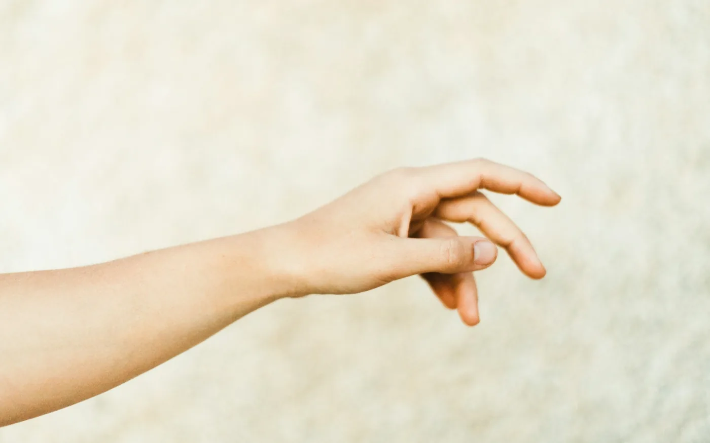 Symptoms follow one nerve path into specific fingers rather than aching vaguely