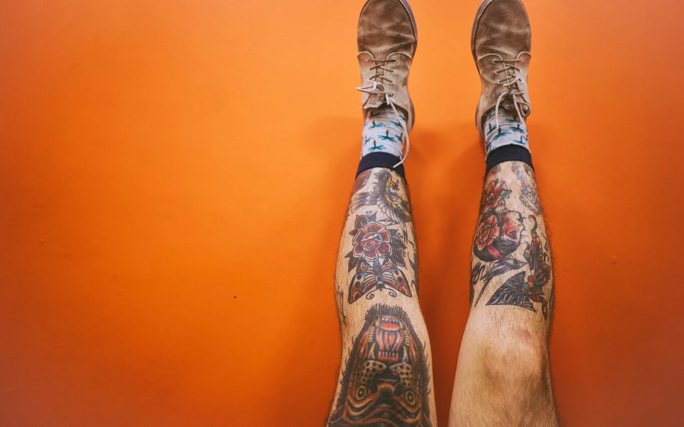 Diffuse tenderness suggests shin splints; one pinpoint spot may be a stress fracture