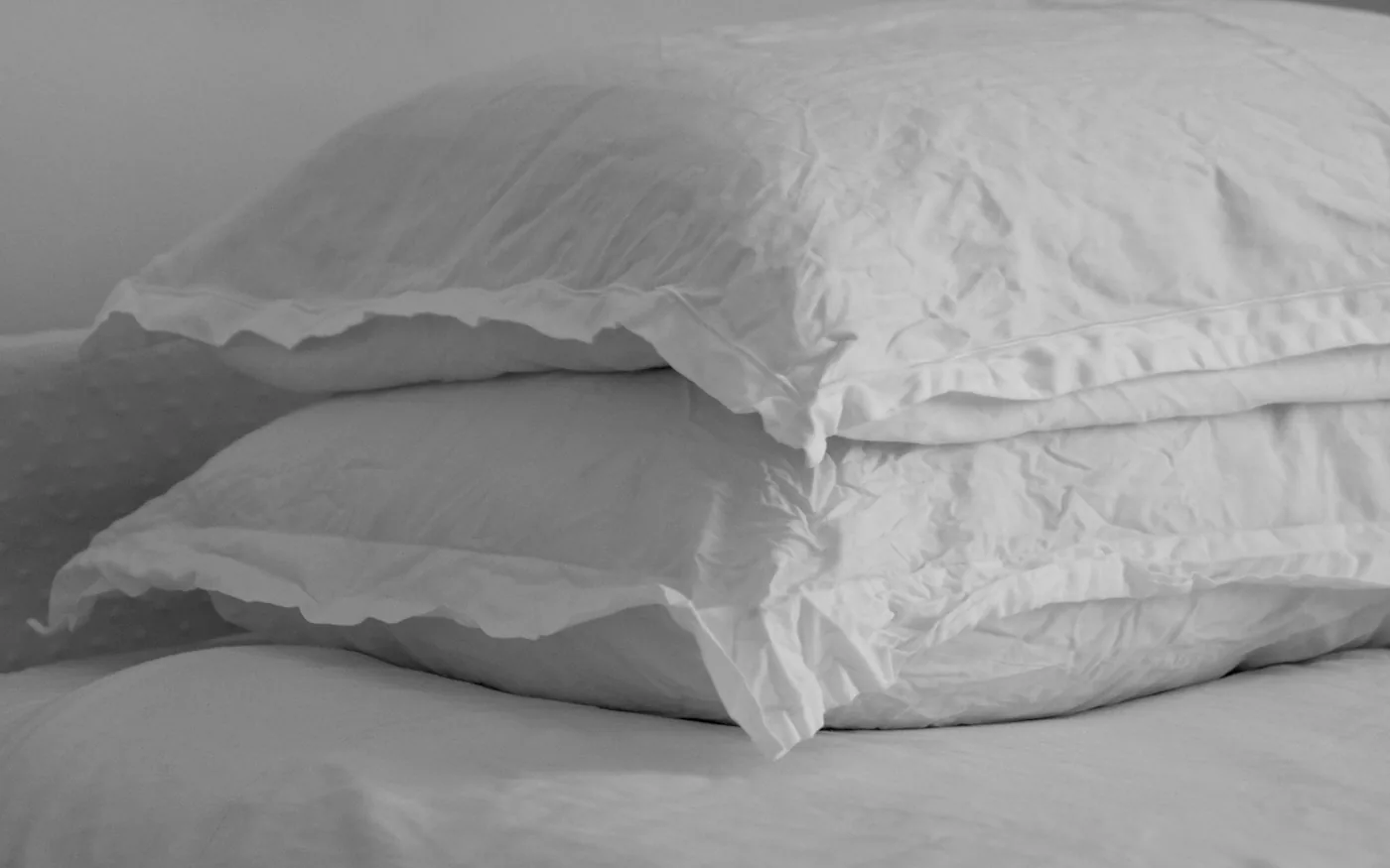 A pillow between the knees keeps the top hip from dropping across at night