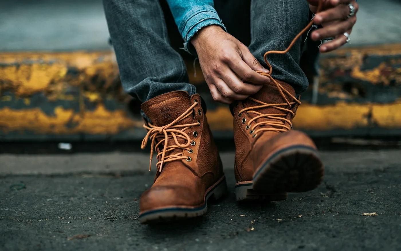 Struggling with socks and shoes is one of the earliest practical signs