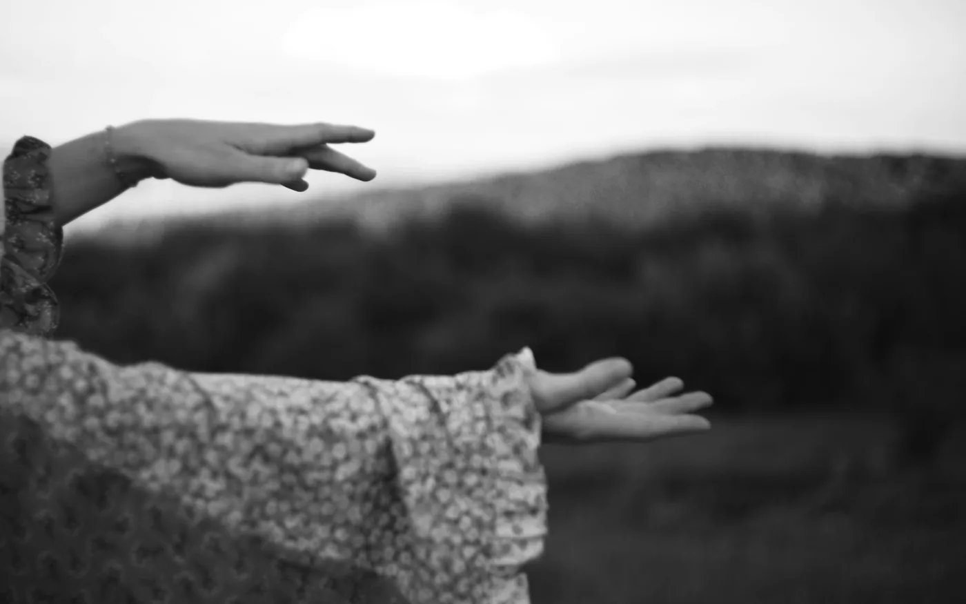 Reaching across the body is the movement that provokes it most