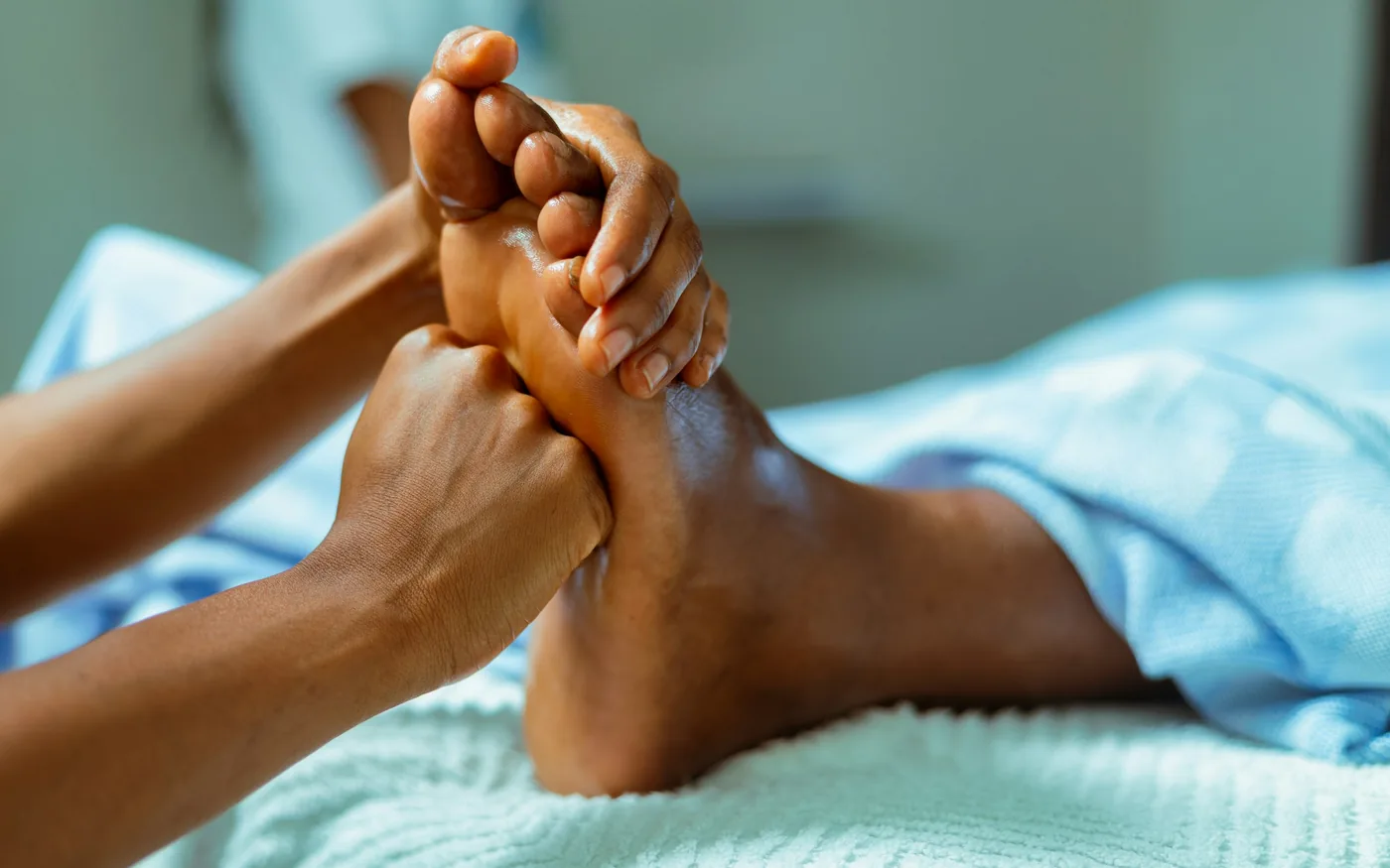 Reflexology works on the feet and hands, and you stay clothed