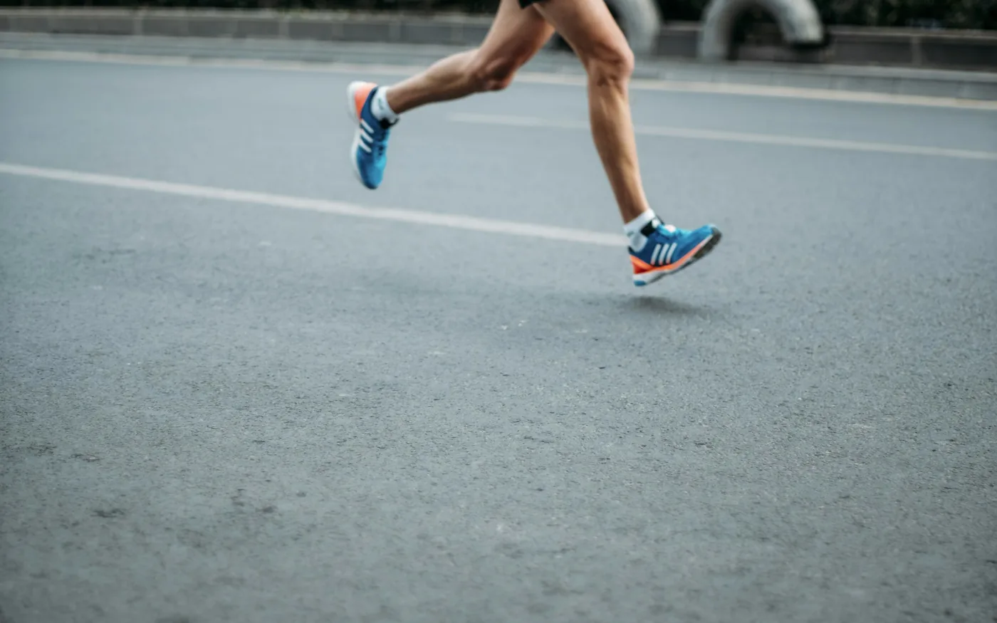 A slightly quicker, shorter stride reduces load through the kneecap