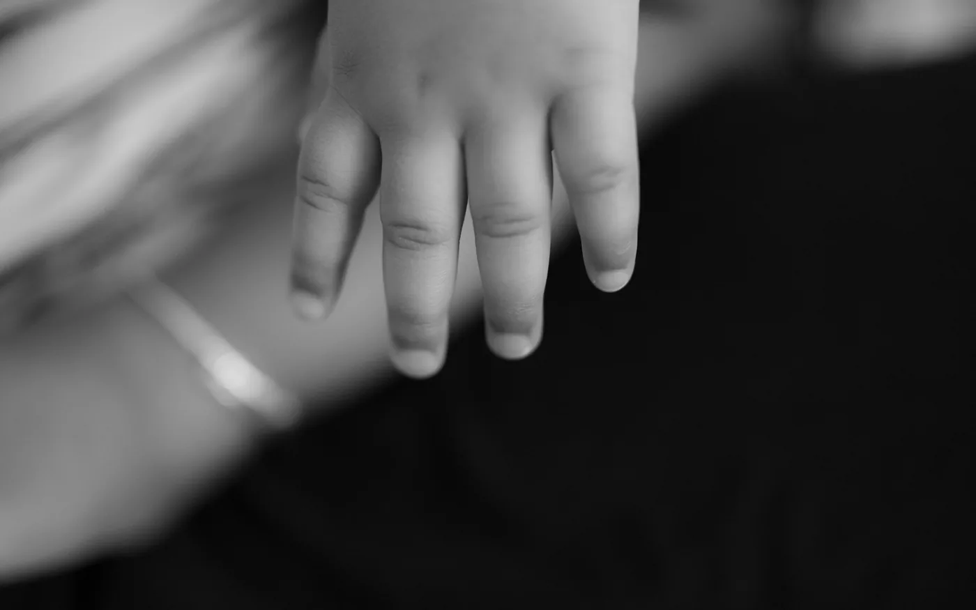 Tingling in the ring and little fingers points at the nerve, not the tendon