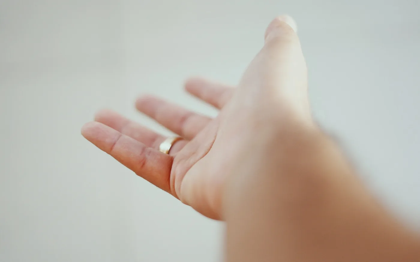 Pain on the little finger side of the wrist rather than the thumb side